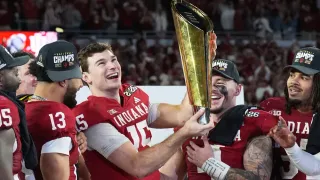 Indiana Completes Undefeated Season and Wins First National Title, Beating Miami 27-21 in CFP Final